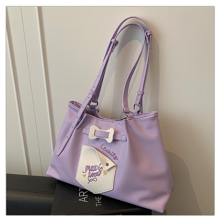 

Large capacity tote bag women s 2025 summer new handbag fresh and sweet wind commuter niche shoulder bag bags фиолетовый