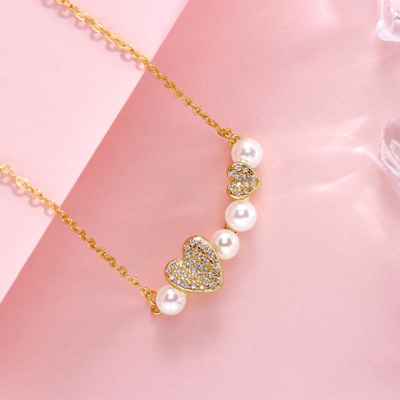 

Hearts Pearl Necklace Women s Retro Light Luxury Love Bead French High Design Sense Necklace