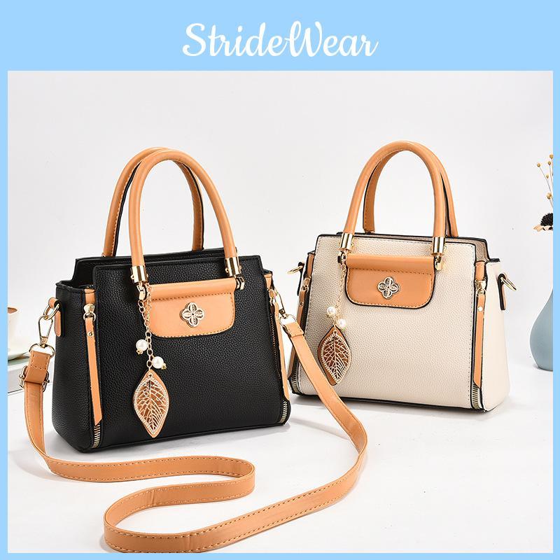 Trendige und geräumige Umhängetasche für Frauen mittleren Alters in eleganten Farben