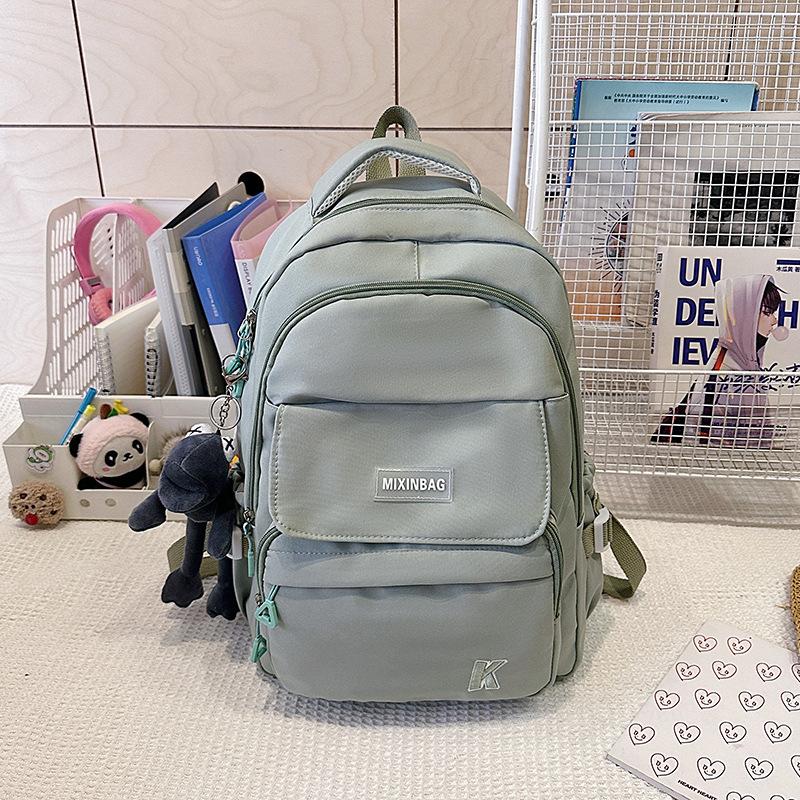New large-capacity multi-compartment lightweight and versatile backpack fashionable junior high school high school student college backpack