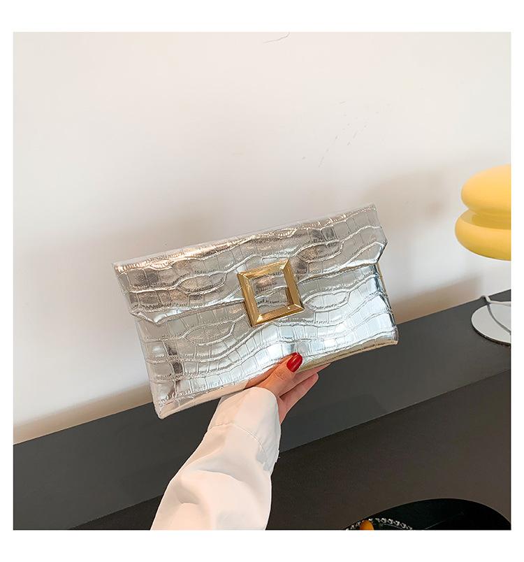 Fashion and exquisite 2025 new solid color trend personalized stone pattern temperament women's dinner hand envelope bag