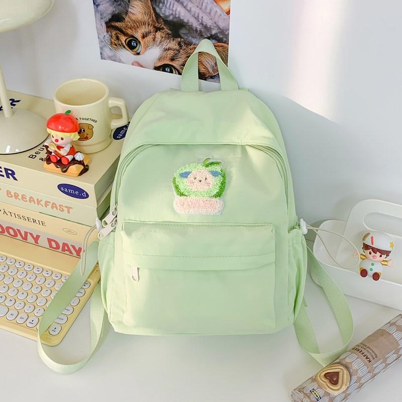 The new schoolbag is high-value, fresh and sweet, candy-colored backpack, lightweight and large-capacity backpack for junior high school students.