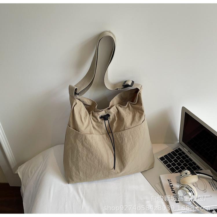 New Fashion Drawstring Shoulder Women's Bag Internet Celebrity Pleated Nylon Messenger Bag Korean Version Niche Casual Literary Tote Bag