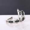 Infinity Design Huggie Hoop Earrings for Women with Black Stone Accents Silver Tone Earrings for Daily and Night Out
