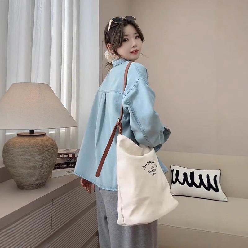 2025 New Hong Kong-Style Women's Denim Shirt Jacket: Casual Spring Loose Fit