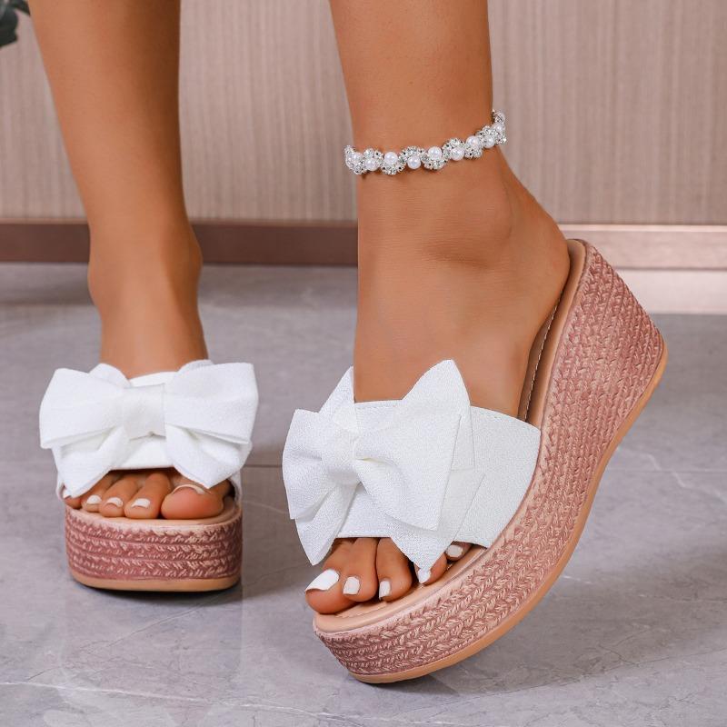 New large size wedge heel bow one-word slippers women's cloth surface thick-bottomed sponge cake beach cool slippers