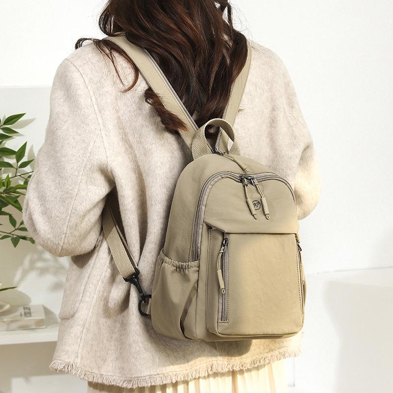 Schoolbag Small Backpack Women's 1011 New Fashion Large Capacity Breast Bag Casual Versatile Multifunctional Women's Travel Backpack