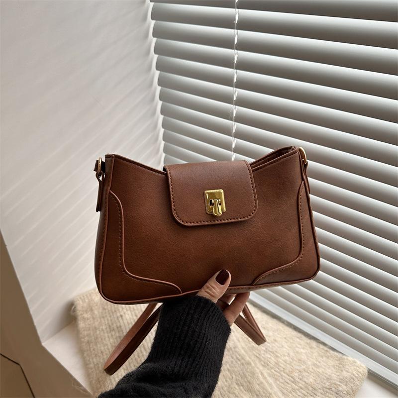

Retro underarm commuter bag 2025 new women s bag high-end texture fashion niche versatile women s shoulder messenger bag светло-коричневого