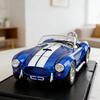 1:24 1965 Shelby Cobra Convertibile Roadster Modello Simulazione Suono Luce Gomma da Tirare Assorbimento degli Urti Regalo di Compleanno per Ragazzi
