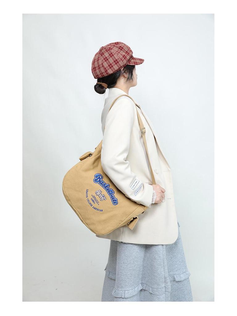 Korean Trendy Canvas Messenger Bag: Large Capacity for Women & Men, Sports Style