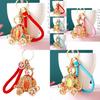 Elegant Pumpkin Car Charm Keychain Accessory For Women With Metallic Finish And Colorful Ropes Ideal For Gifts And Special Occasions