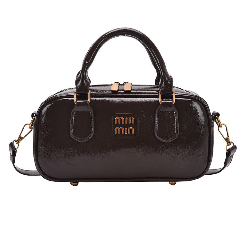 

2024 Женская нишевая сумка-боулинг большой вместимости – Стильная универсальная сумка-тоут и кроссбоди в форме подушки кофейный