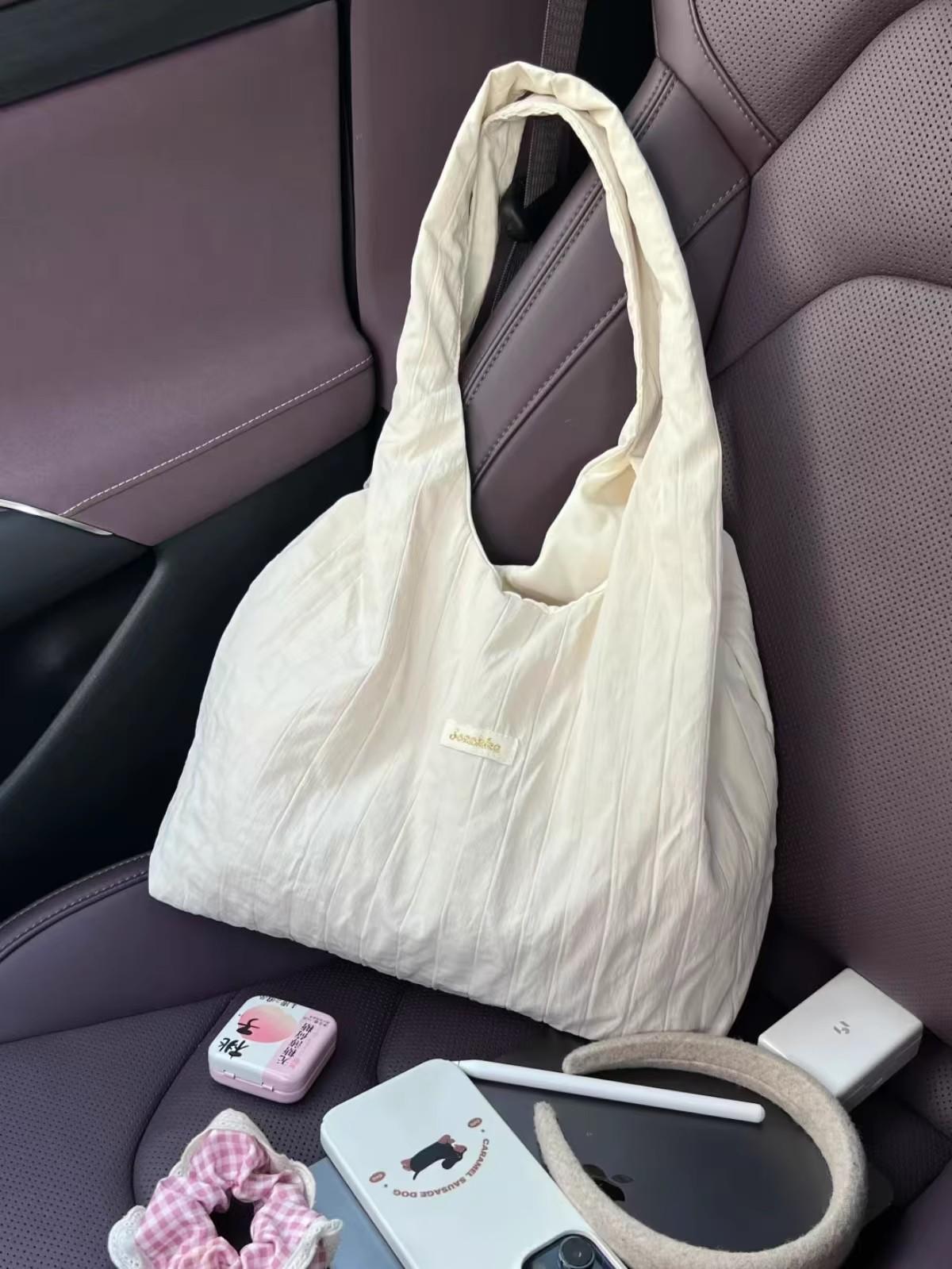 

Korean red pleated striped canvas bag women s 2025 new large-capacity shoulder tote bag commuter shopping bag