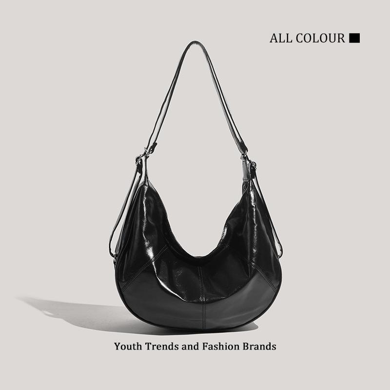 Dumpling bag new large-capacity commuter niche high-end messenger bag woman