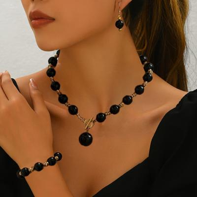 Elegante Conjunto de Collar, Pulsera y Pendientes de Cuentas Negras