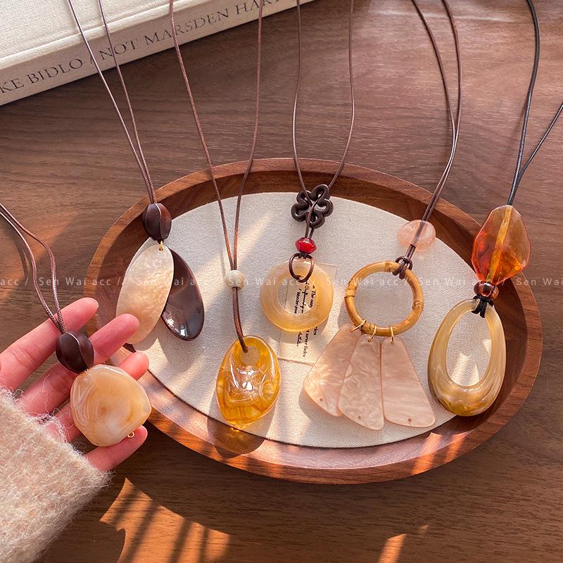 Autumn and winter Maillard coffee color smudge long necklace sweater sweater chain accessories