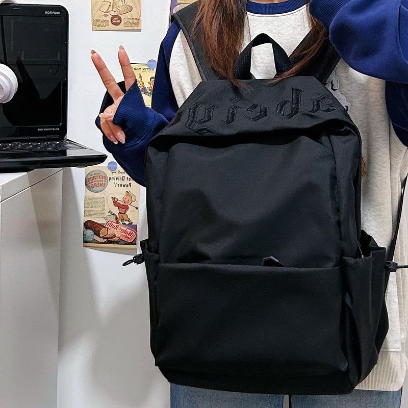 Schoolbag simple solid color middle and high school student schoolbag female 1011 new male large capacity backpack short trip backpack
