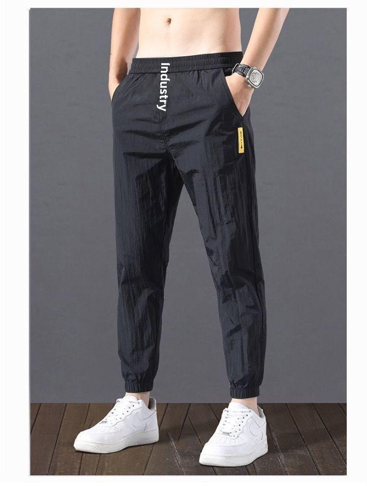 2023 Men's Korean-Style Ice Silk Casual Pants, Quick-Drying, Trendy, Loose-Fit Nine-Point Sports Pants for Summer.