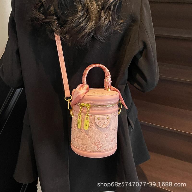 Hot-selling versatile high-end Korean version temperament portable bucket bag niche cute embossed women's messenger bag