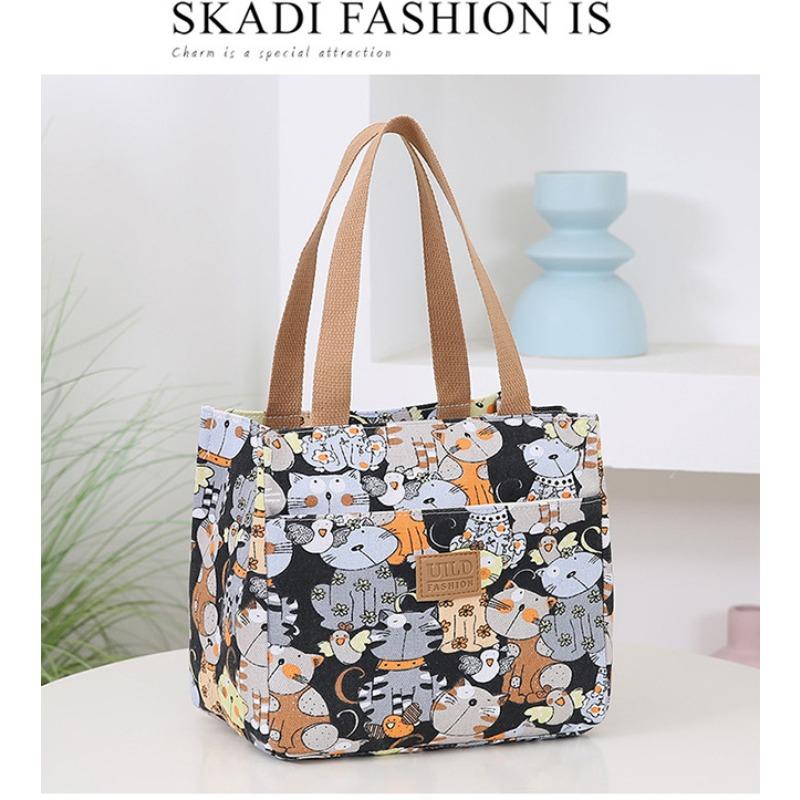 

New fashionable women s hand-held printed canvas bag thickened large-capacity aluminum foil bento thermal insulation tote bag