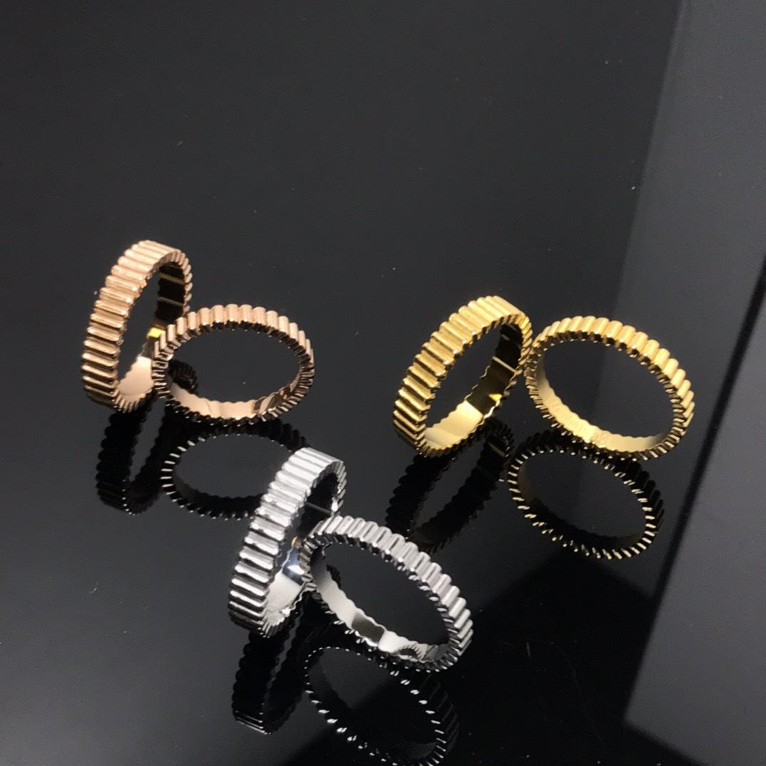

Luxury Baojia Gold-Plated Striped Band Couple Rings Size 7