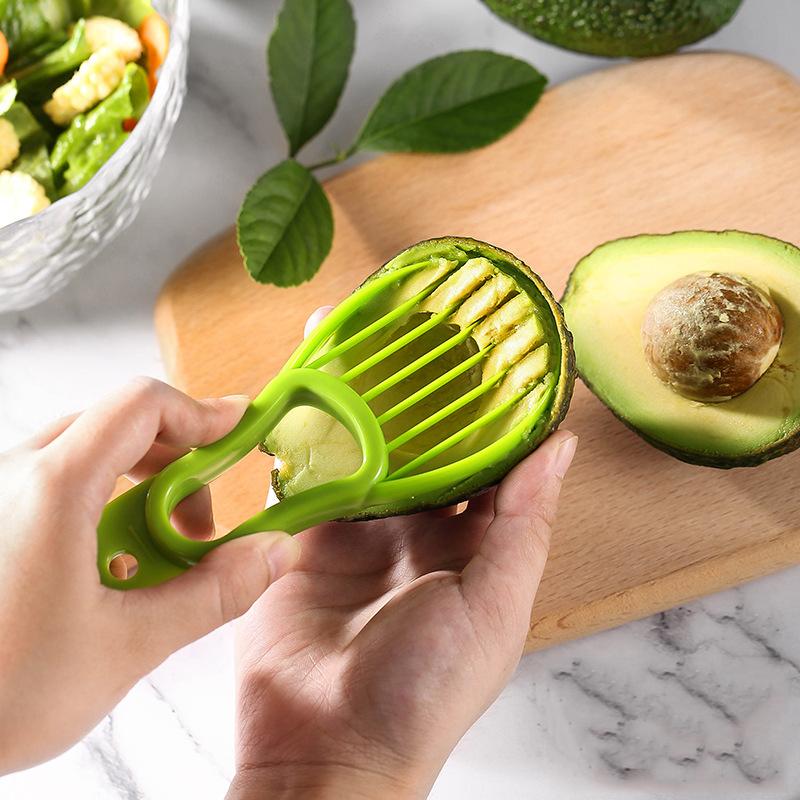 3 In 1 Avocado-Schneider Shea-Entkerner Butterfrucht-Schäler Schneider Fruchtfleisch-Separator Kunststoffmesser Küchengemüsewerkzeuge