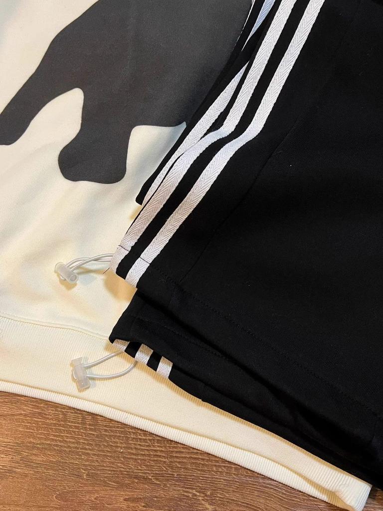 Damskie dresowe spodnie w paski, drapowane, z prostą nogawką, Wiosna/Jesień 2025: Wszechstronne szerokie nogawki, mankiety, swobodny krój.