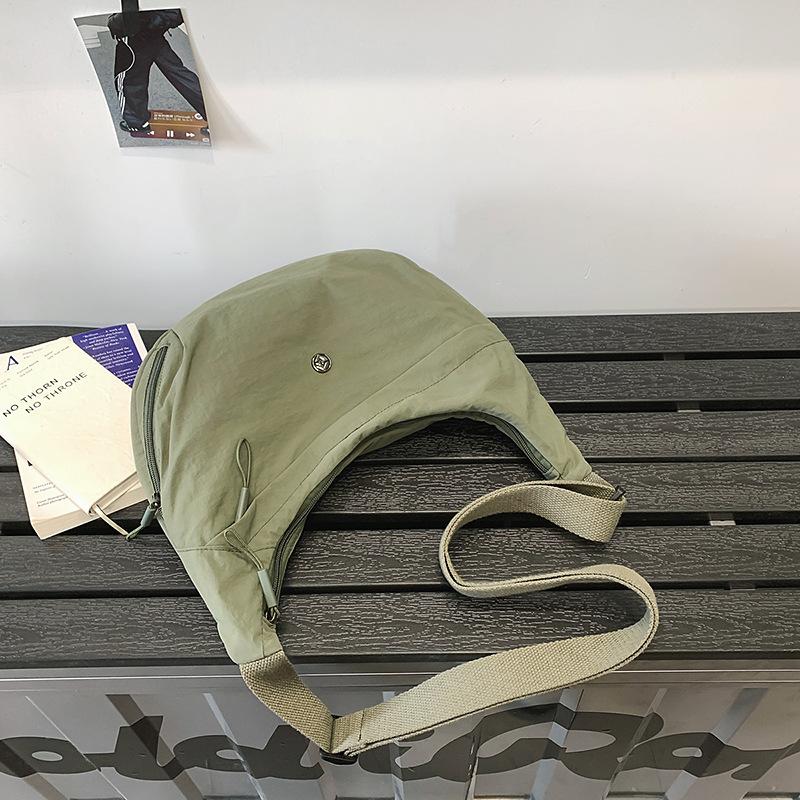 Crossbody bag women's dumpling small bag summer large capacity bag couple casual light sports canvas bag men