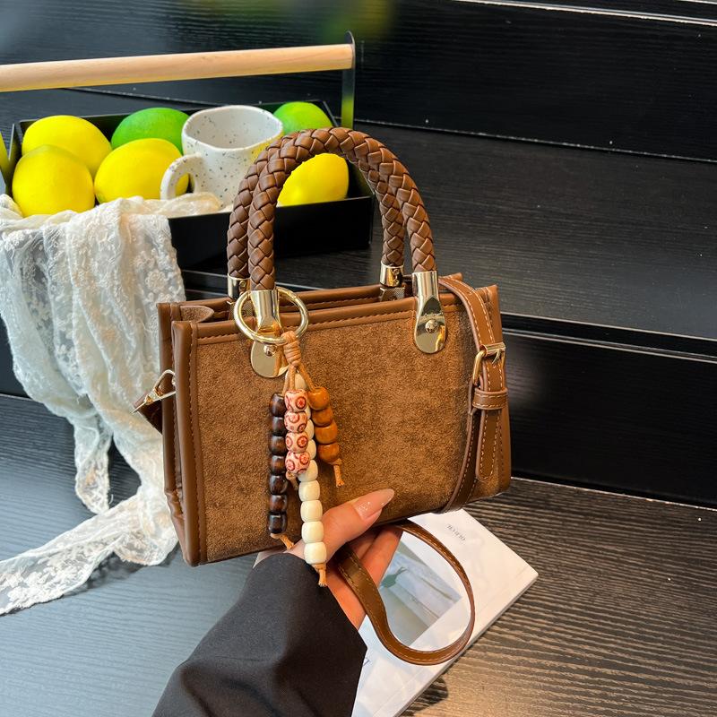 Niche design small bag female leopard print 2025 new Japanese and Korean fashion shoulder bag woven portable messenger small square bag