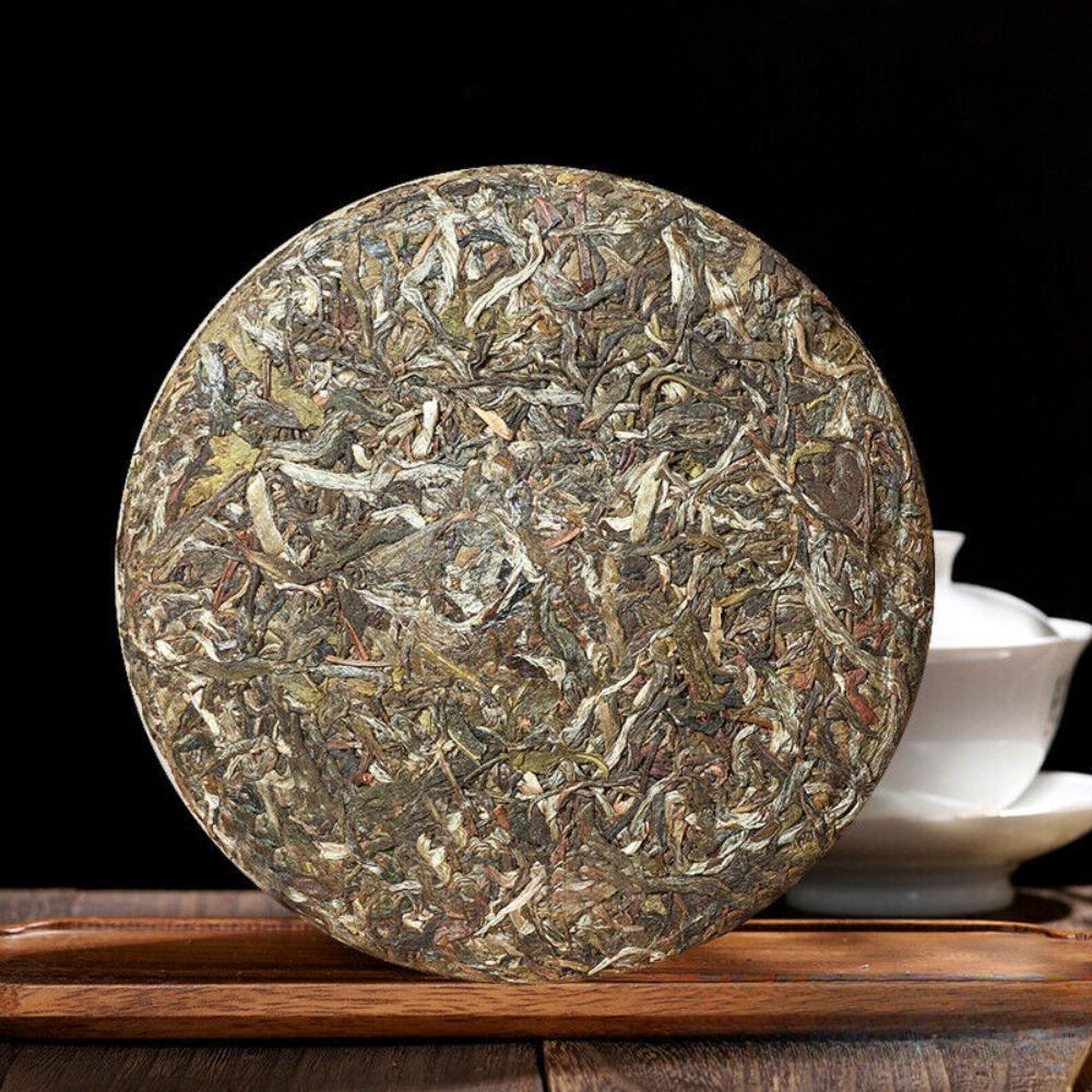 Menghai early spring Pu'er raw tea Yunnan Qizi cake tea  ancient tree tea