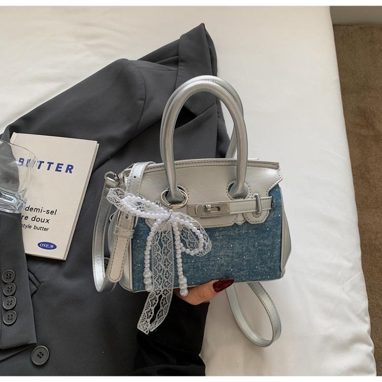 

2025 summer new contrasting platinum handbag bag women s fashion European and American fashion shoulder bag high-end texture messenger bag