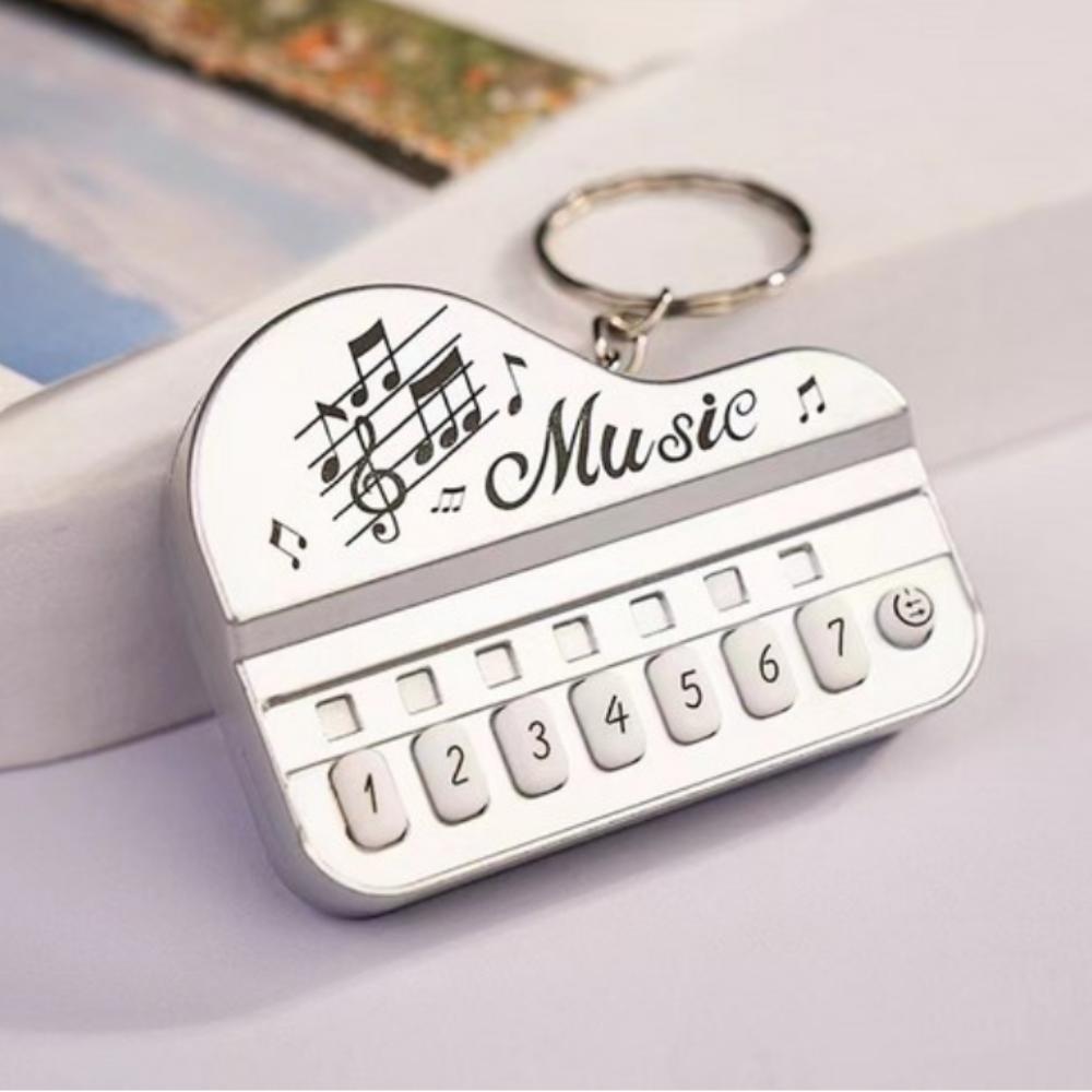 Melody-playing keyring, cute mini piano-style keychain