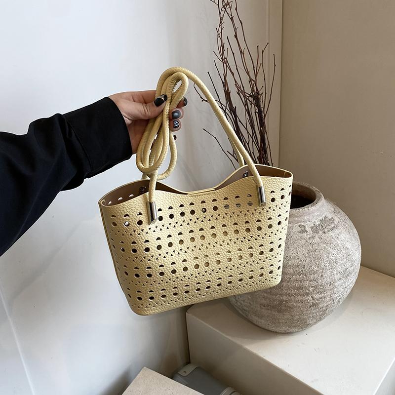 Large-capacity hollow bag women's summer versatile shoulder mother and child bag leisure work commuter tote bag