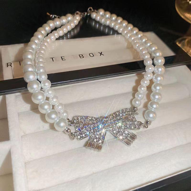 Двухслойное ожерелье с бантом из супер-блестящего жемчуга, ожерелье с жемчугом и бриллиантовым бантом, женственный дизайн, маленький аромат