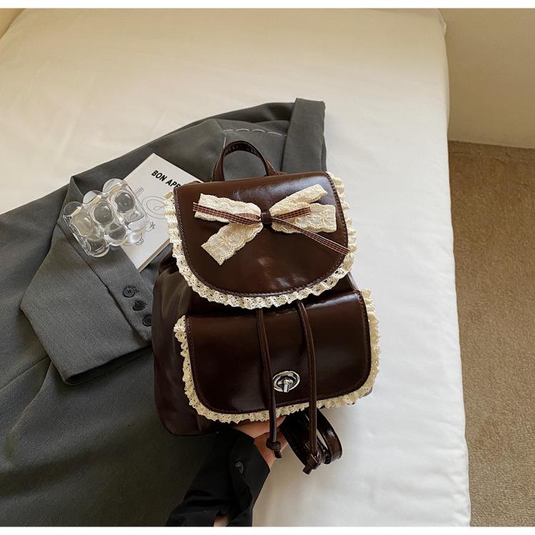 

Двойной рюкзак женский 2025 корейская версия новая мода иностранный стиль рюкзак кружево милый балетный стиль дорожный рюкзак тренд темно-коричневого