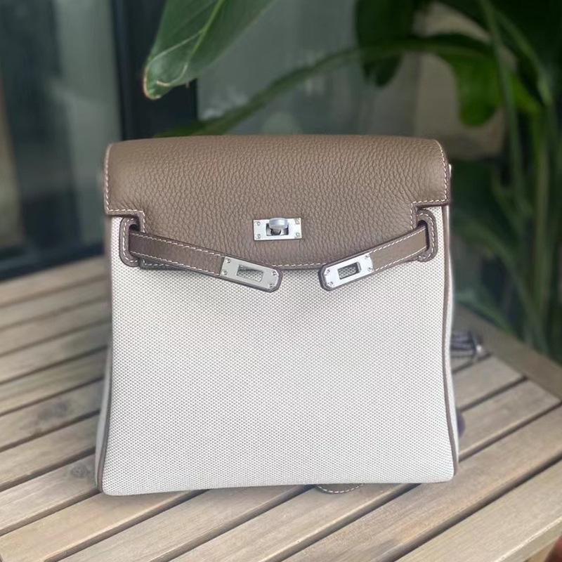 Новый рюкзак Kelly большой емкости из холста с коровьей кожей первого слоя модный повседневный рюкзак контрастный цвет простая дорожная сумка Length 22x thickness 8x height 23cm темно-серого 11700₽