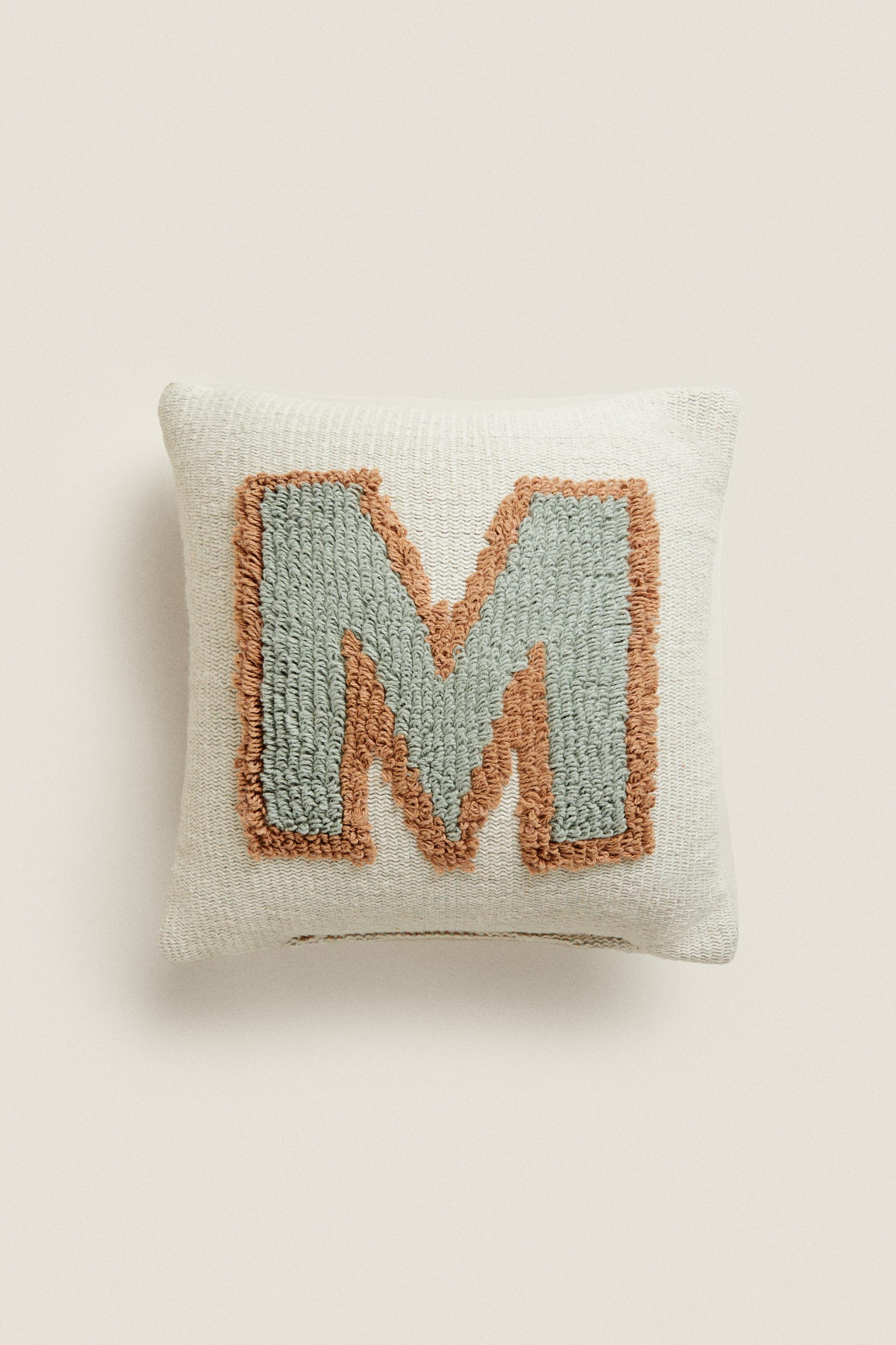 

LETTER M CUSHION