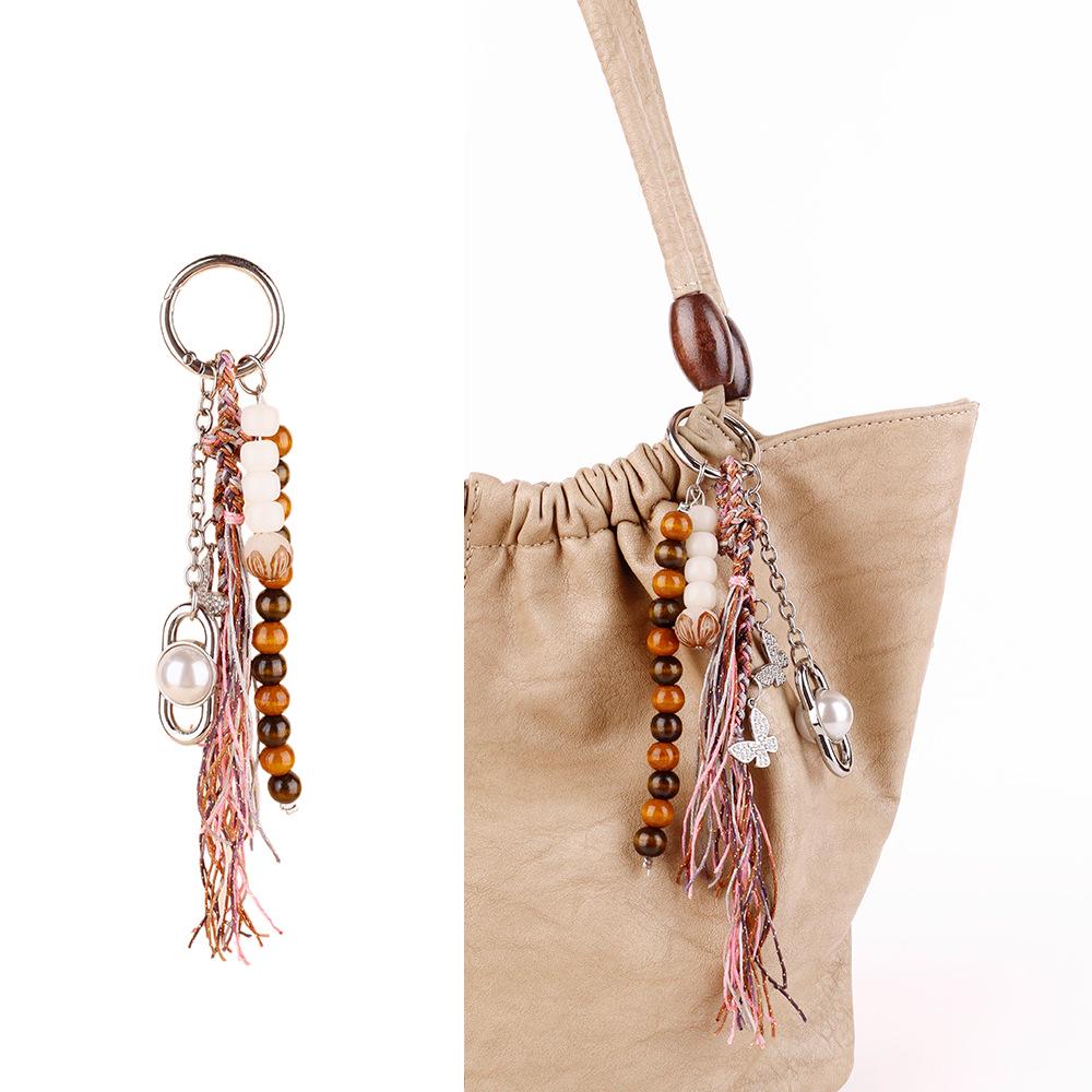 Retro Quasten-Schlüsselanhänger mit Naturholzperlen & Schleife