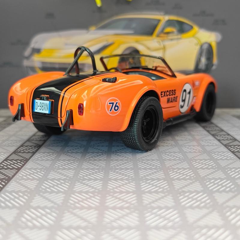 CDKM1 1:22 simulation Ford Cobra convertible sports car alloy model car ornament, door can be opened, steering shock absorber