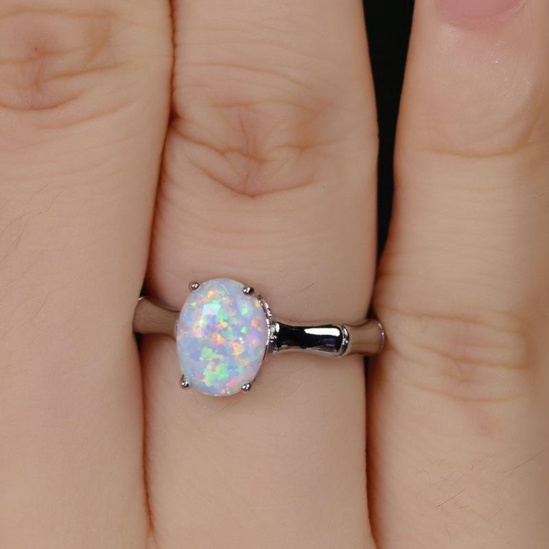 Wish Simple White Opal Egg Shaped Bamboo Four-claw Ring Personalized Light Luxury Ring Ring Women