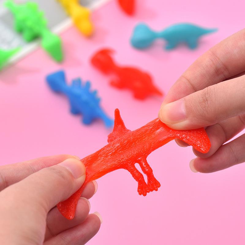 Dinosaur Finger Dart Toy: Launchable Soft Rubber Dinosaur for Stress Relief and Entertainment