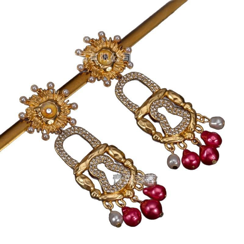 Middle Aged High-end Earrings Xiapa Runway Style Sun Eye Lock Pearl Exaggerated Personality Feel