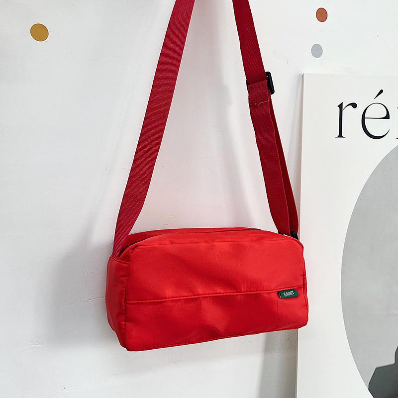 

Fresh and sweet nylon messenger bag bag women s trend fashion pillow bag commuting simple casual shoulder bag one size fits all красный