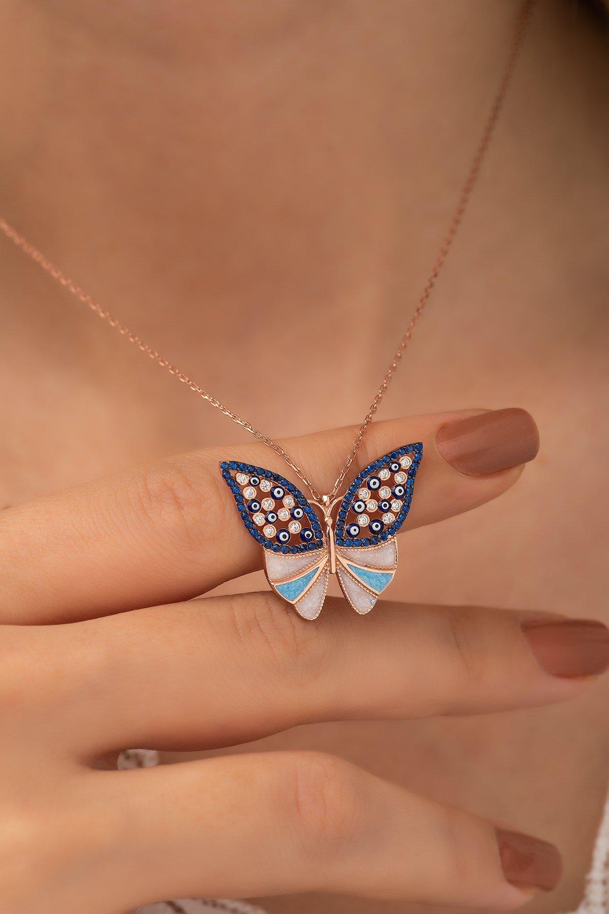 

Женское серебряное ожерелье с бабочкой из синего камня