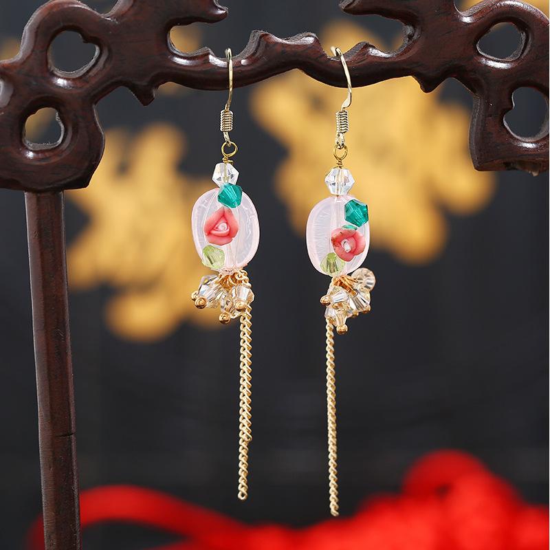 

Handmade classical natural pearl agate earrings, ethnic style women s stud earrings, retro Mori temperament, long fringed earrings.