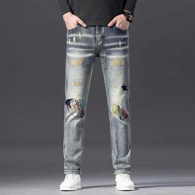 Nostalgic Men's Retro Jeans with Embroidered Patches and Graffiti Wash