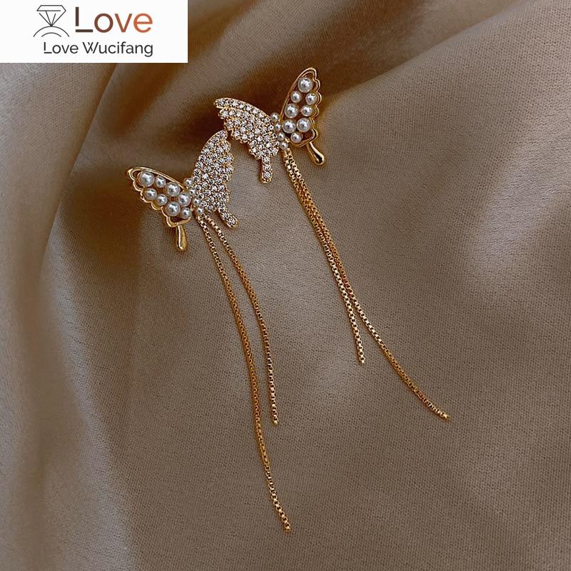 

Новые искусственные жемчужины бабочка длинная кисточка темперамент сетка красные серьги ювелирные изделия женские серьги в стиле морского праздника