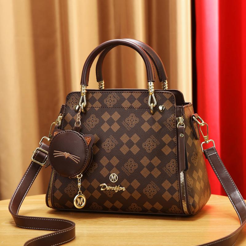 

Сумка женская 2025 новая тенденция цветы универсальная трендовая диагональная большая вместимость плечевая кроссбоди портативная женская сумка