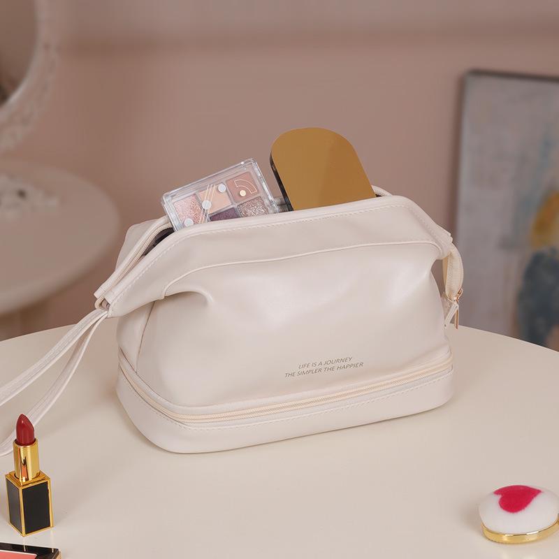 Double-Layer Cloud Makeup Bag - Large Capacity, Portable, Waterproof Toiletry Bag for Travel and Evening Parties.