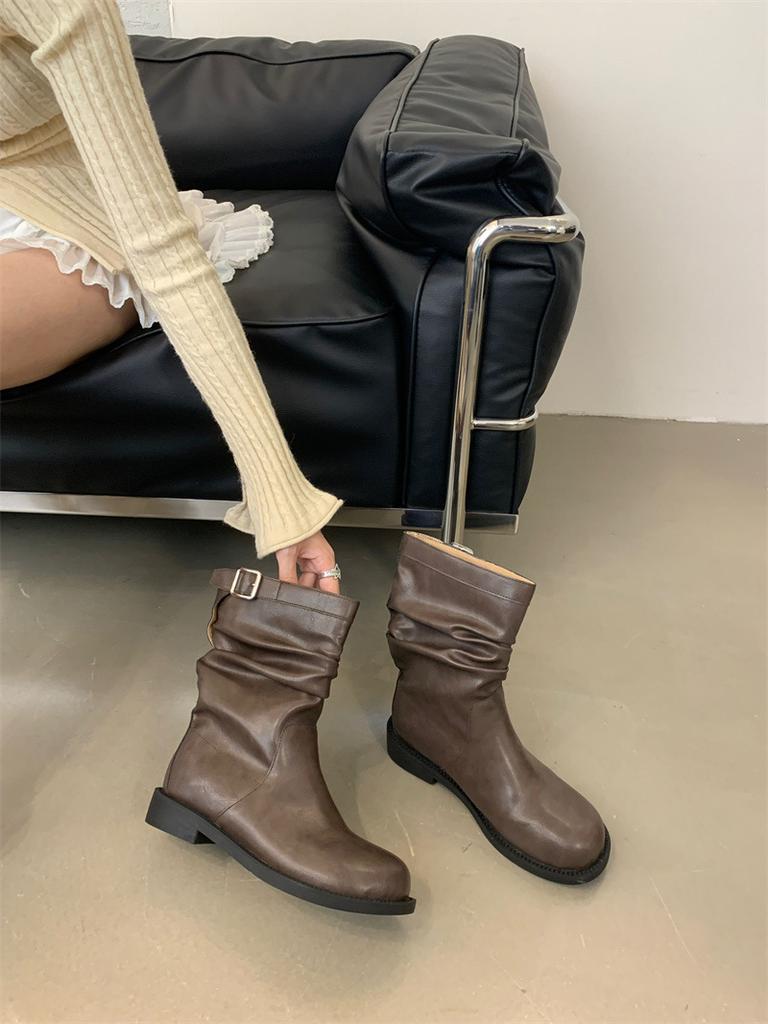 Flat-bottomed short boots women's 2025 new autumn and winter super fire stacking boots round head sleeve medium boots